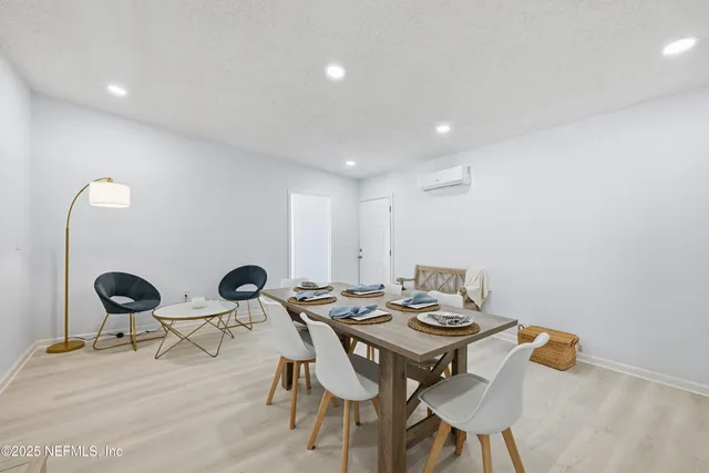 a view of a table and chairs in a room
