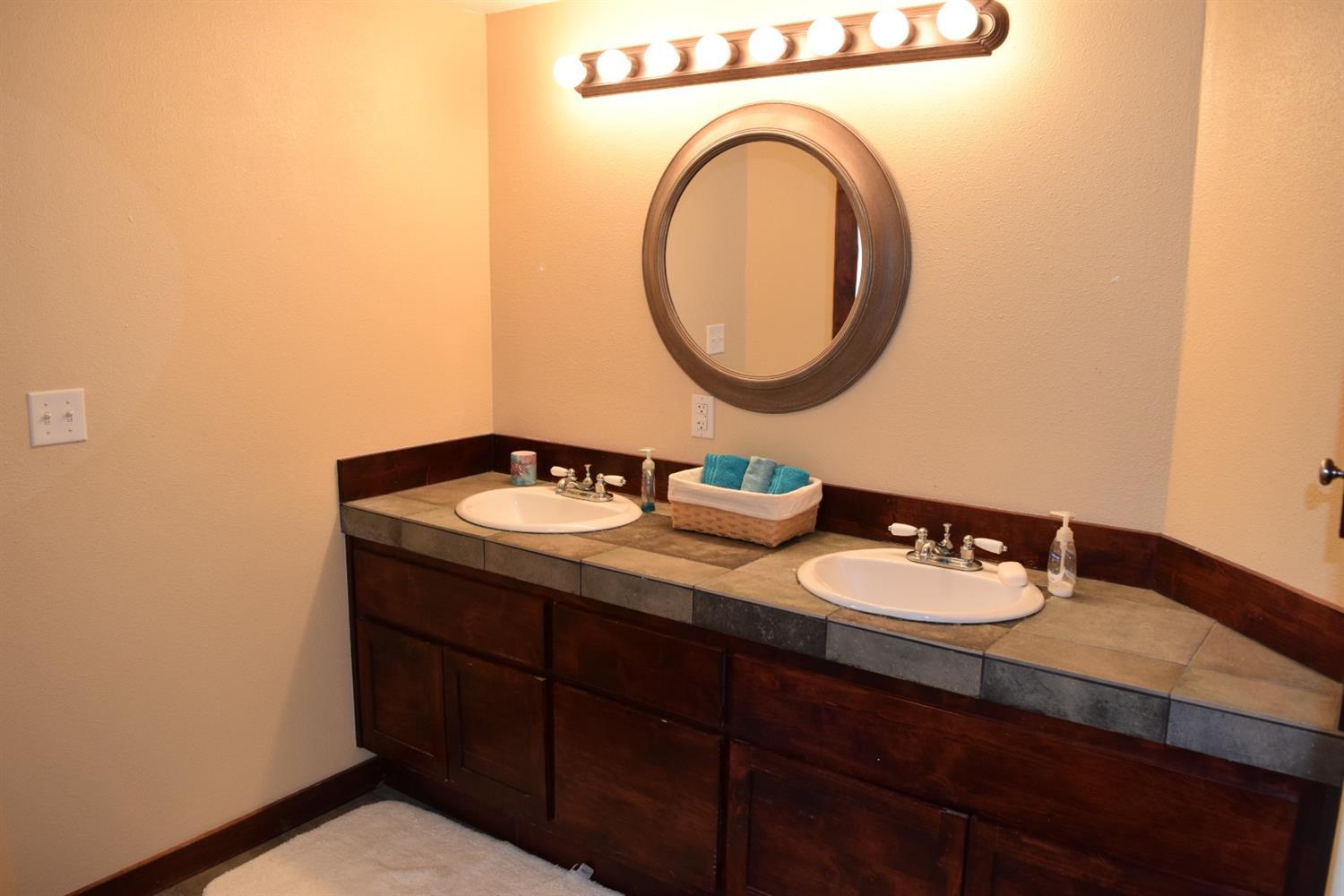 847 Big Bend Road Roseburg, OR 97471 - Photo 20 of 25 a bathroom with a sink and a mirror