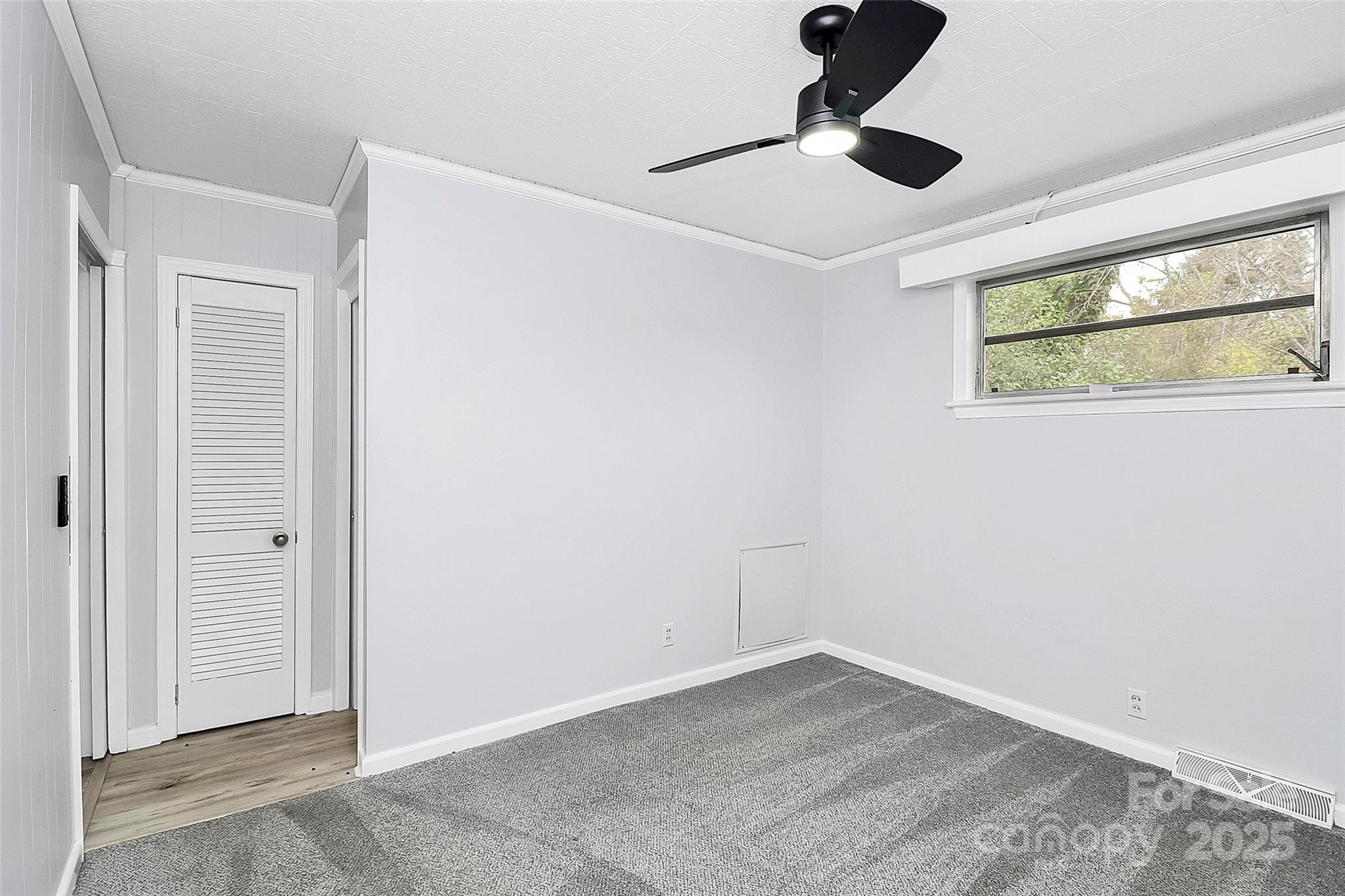 105 Deaver Street Chester, SC 29706 - Photo 26 of 41 a view of empty room with wooden floor