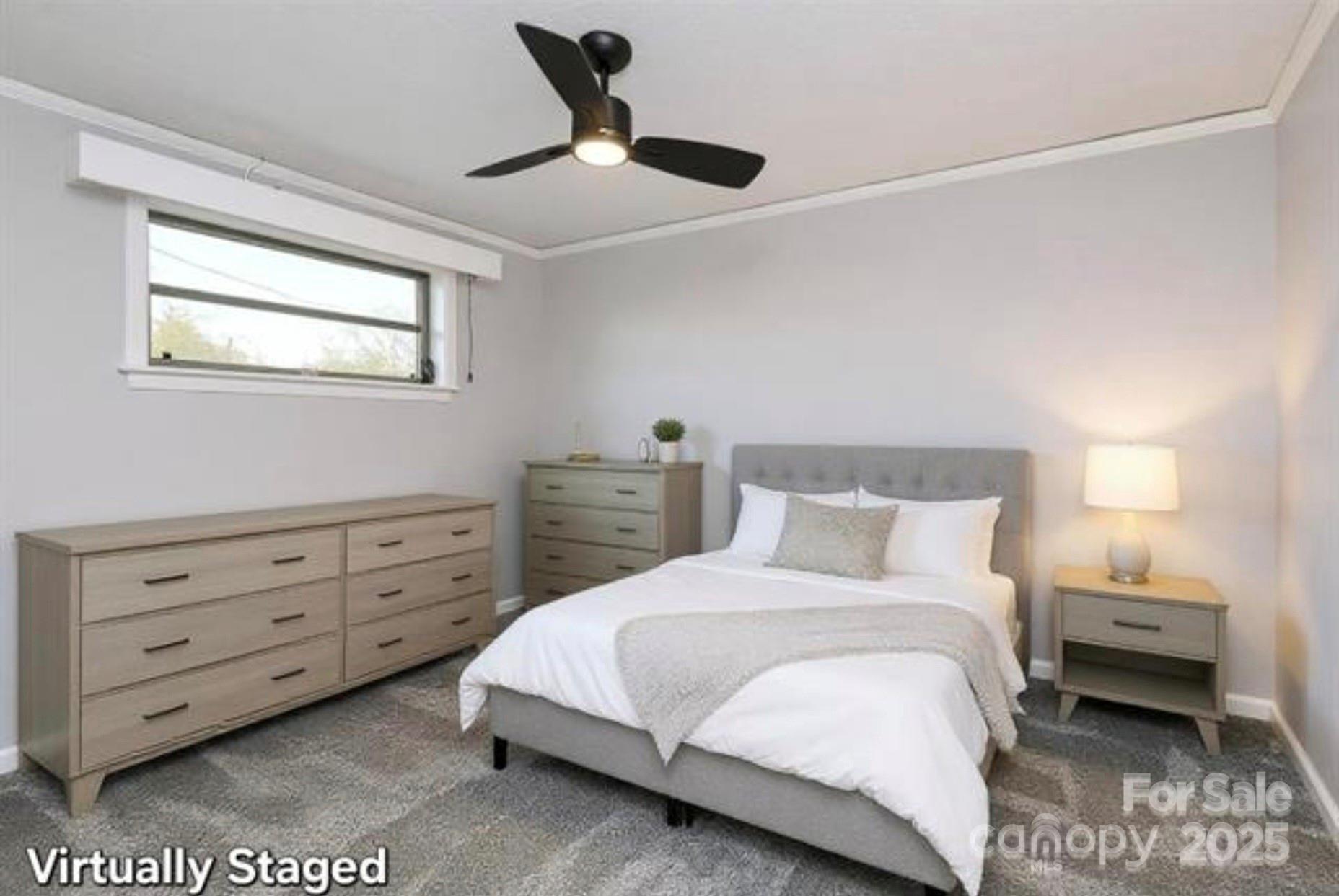 105 Deaver Street Chester, SC 29706 - Photo 27 of 41 a bedroom with a bed and a dresser