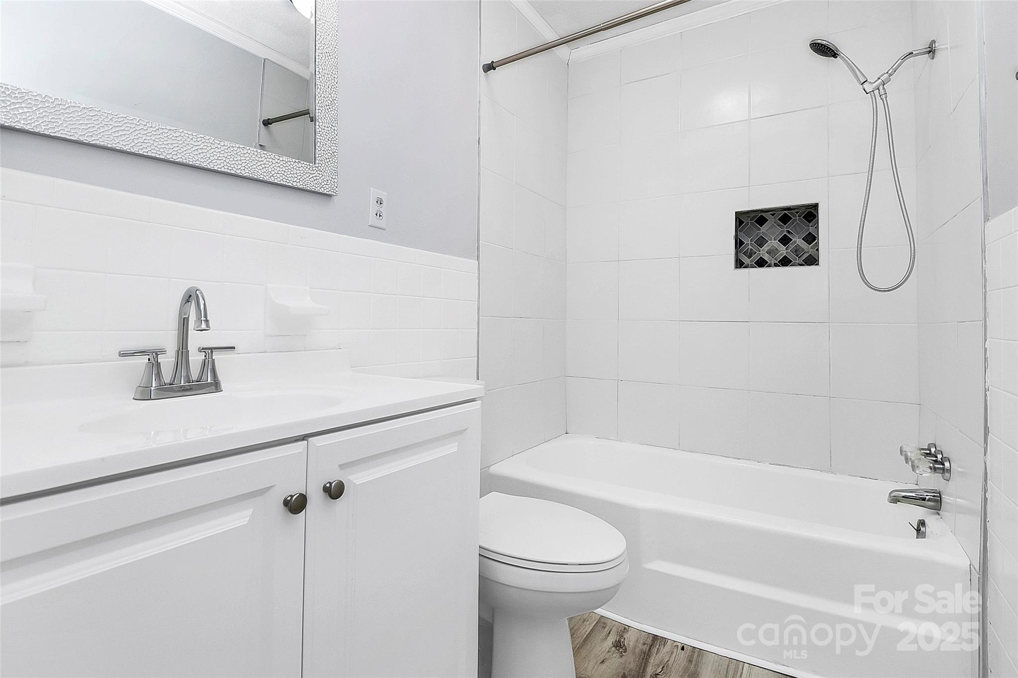 105 Deaver Street Chester, SC 29706 - Photo 29 of 41 a bathroom with a granite countertop sink a toilet and shower