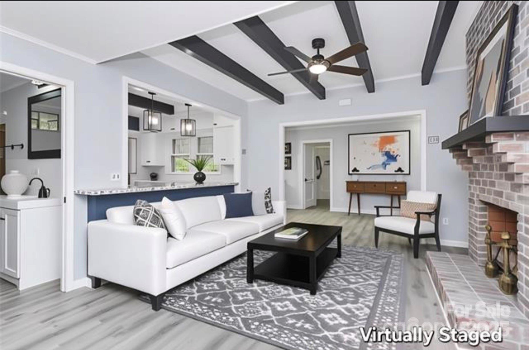 105 Deaver Street Chester, SC 29706 - Photo 3 of 41 a living room with furniture and a fireplace