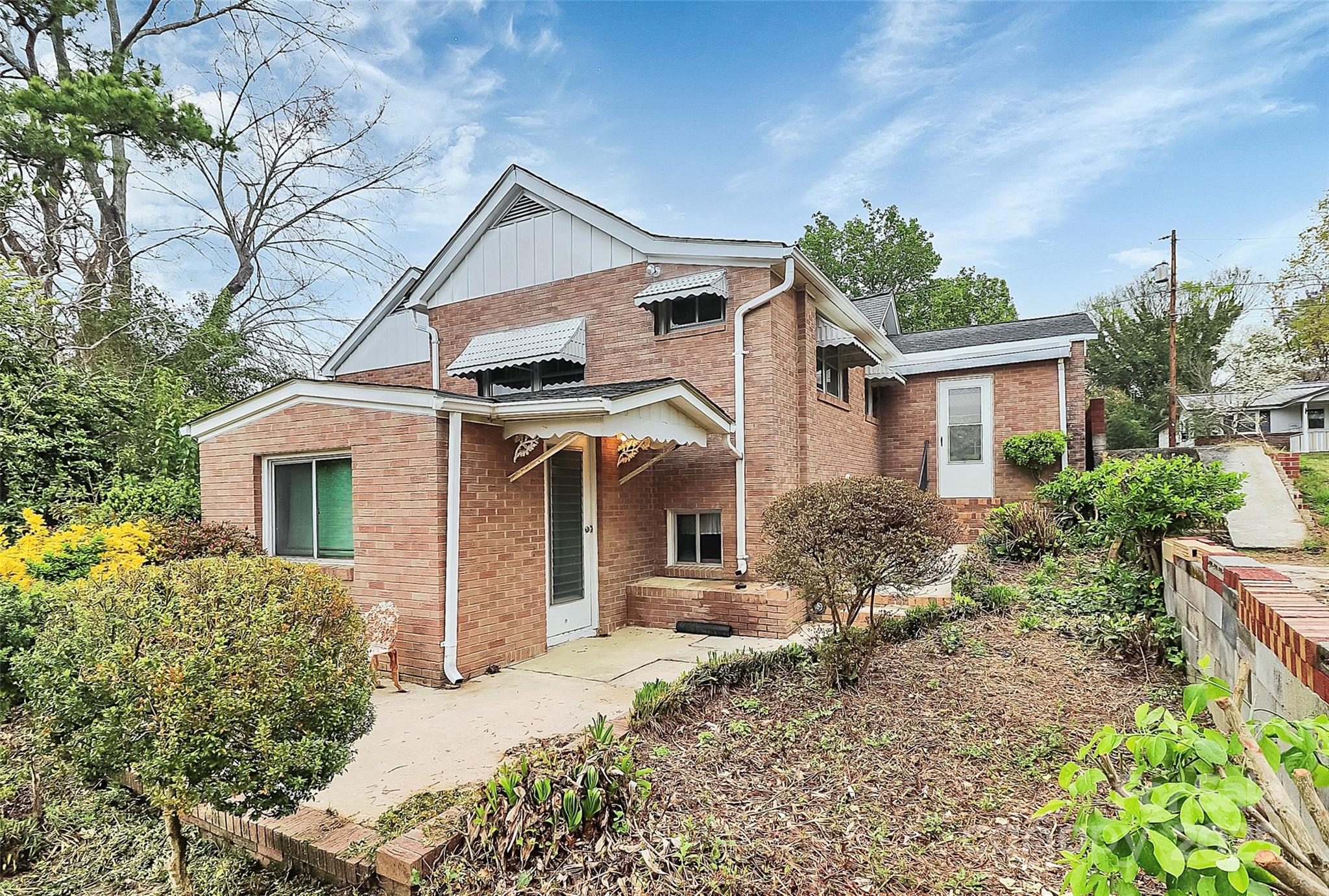 105 Deaver Street Chester, SC 29706 - Photo 38 of 41 a front view of a house with garden
