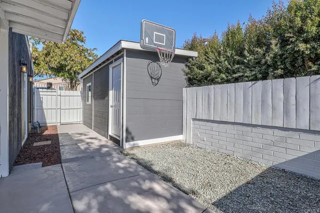 a backyard of a house with lots of green space