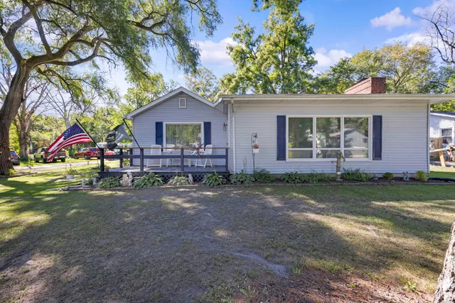 a view of house with outdoor space and entertaining space