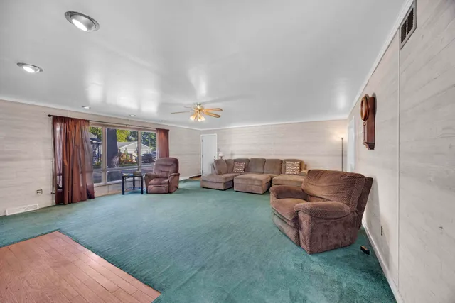 a living room with furniture and a couch