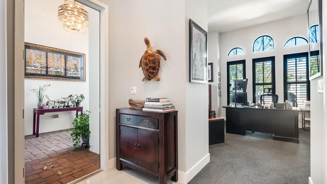 a bathroom with a granite countertop toilet a sink and a bathtub