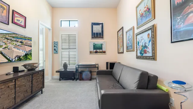 a large kitchen with a table and chairs