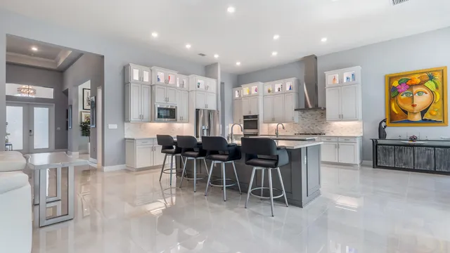 a view of a house with backyard and porch