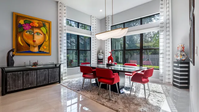 an aerial view of residential houses with outdoor space
