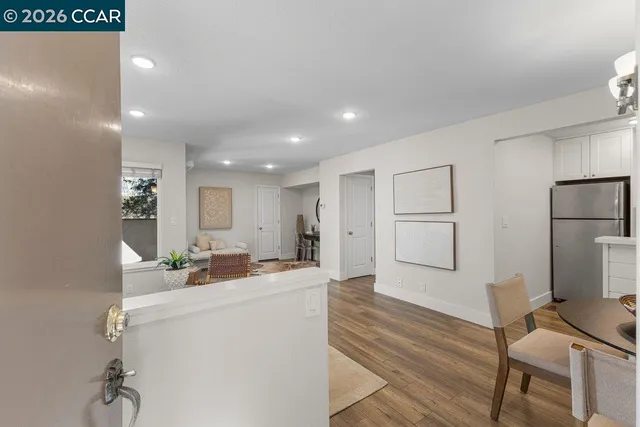 a room with a chair and gym equipment