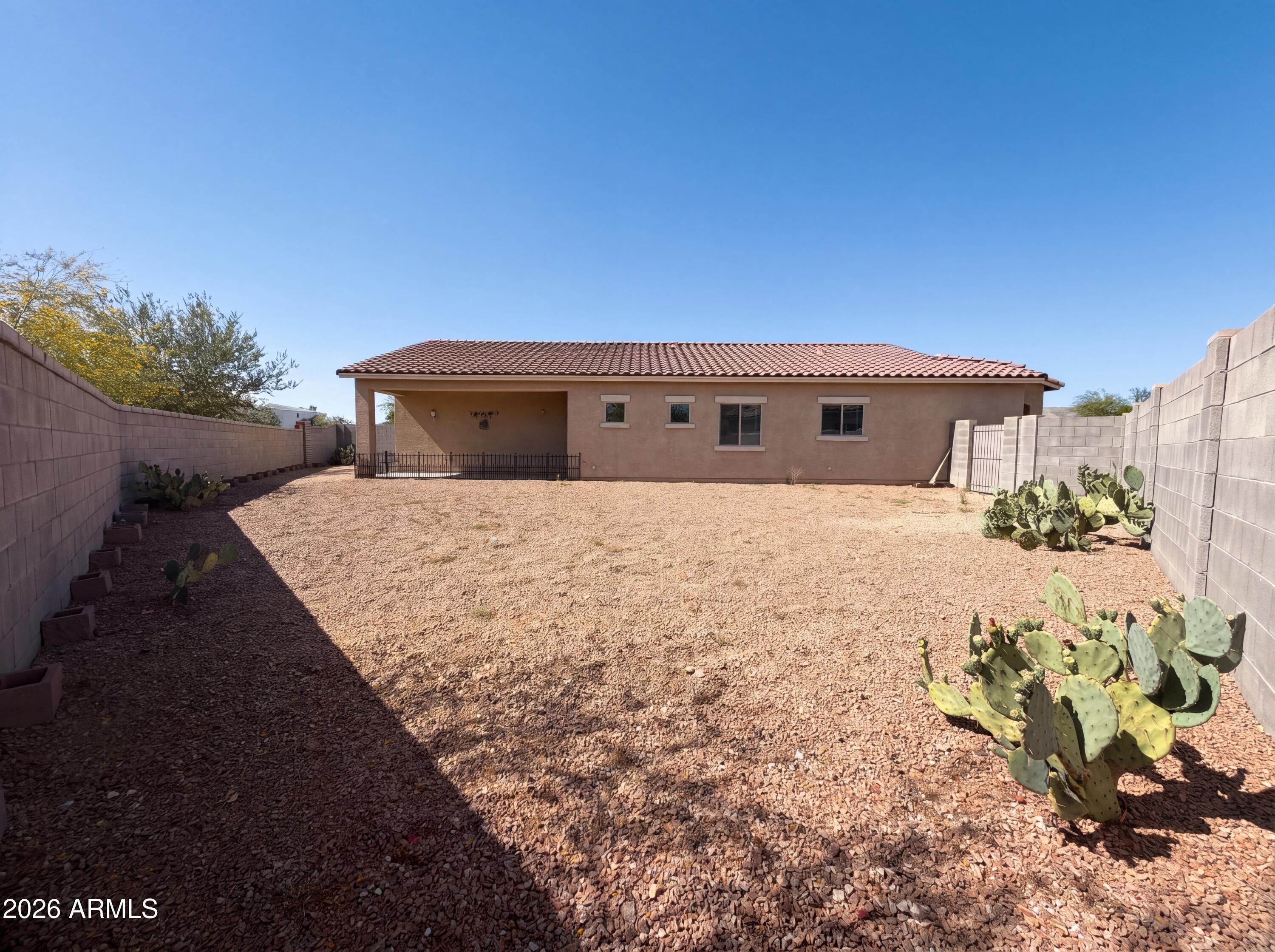 1738 South Aryelle Road Apache Junction, AZ 85119 - Photo 5 of 17 a view of a house with a yard