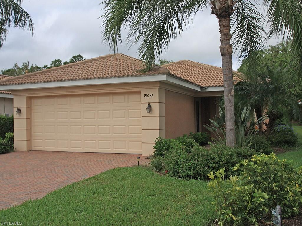 19636 Villa Rosa Loop Estero, FL 33967 - Photo 2 of 21 a view of a house with a yard