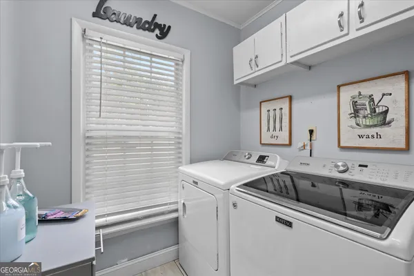a bathroom with a white toilet and a shower