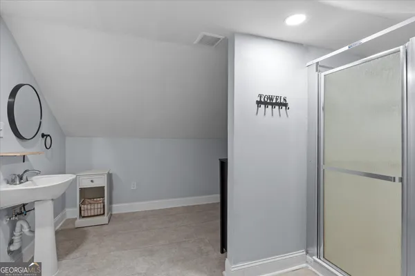 a view of a bench in a backyard