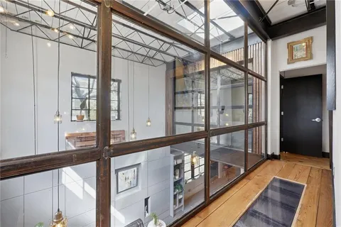 a room with furniture and a window
