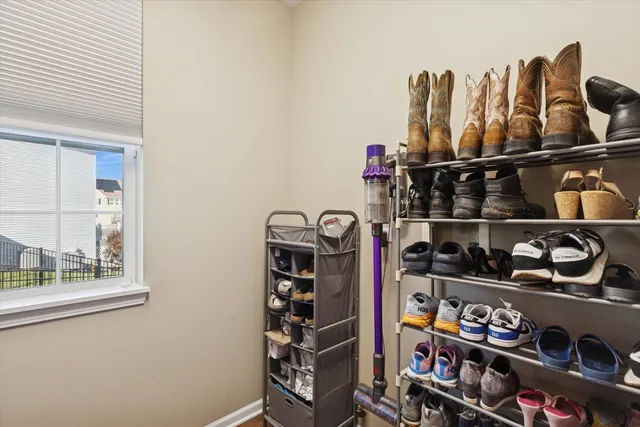 a shelf with books and knick knacks on it