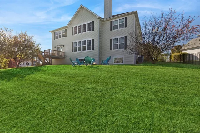 a view of a house with a big yard