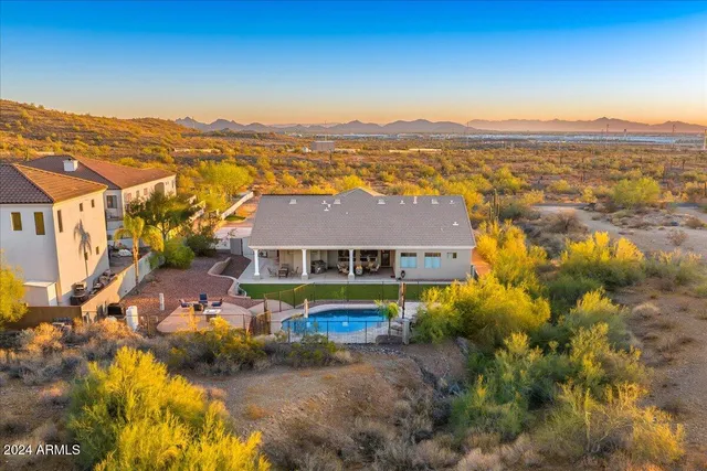 a view of a city with mountains in the background