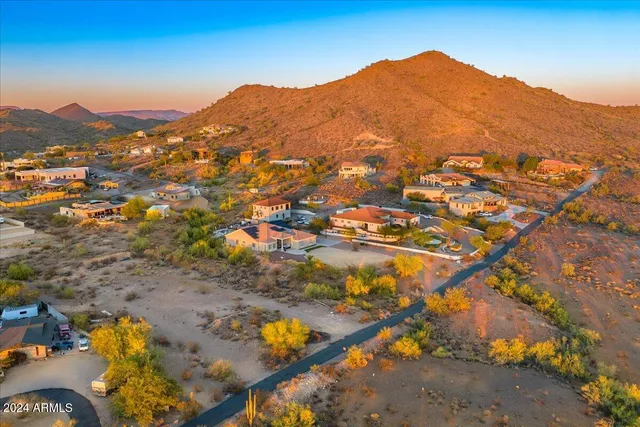 aerial view of a house with a mountain view