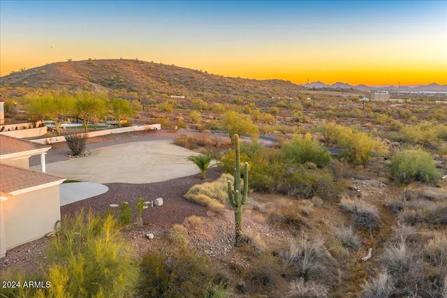 front view of a house with a garden