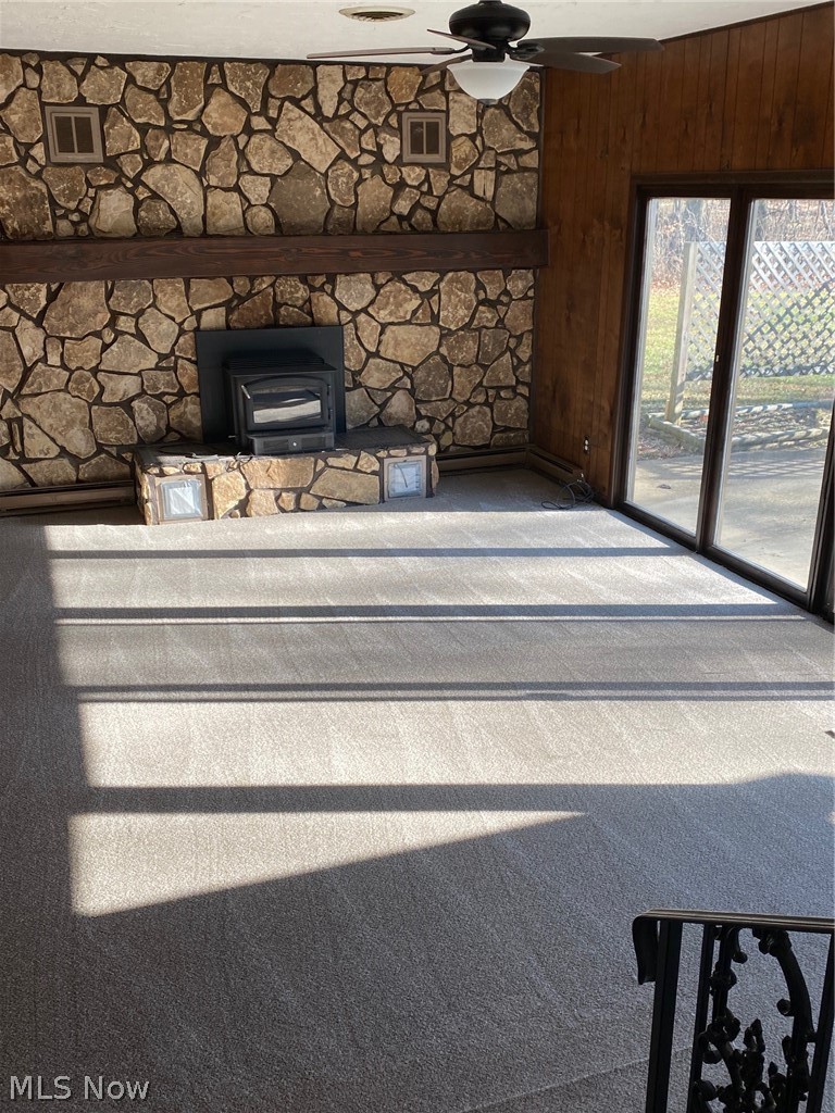 13404 Thompson Road Vermilion, OH 44089 - Photo 13 of 34 Family room with wood burner