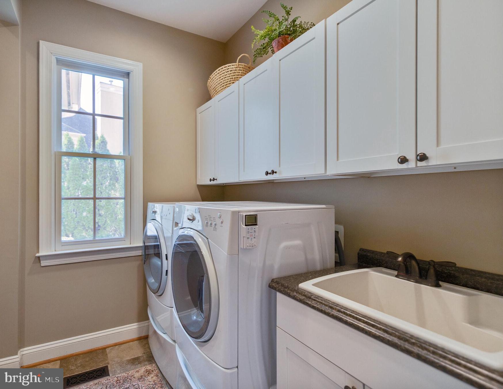 8347 Roxborough Loop Gainesville, VA 20155 - Photo 18 of 52 Large laundry room with full bath (roll in shower)