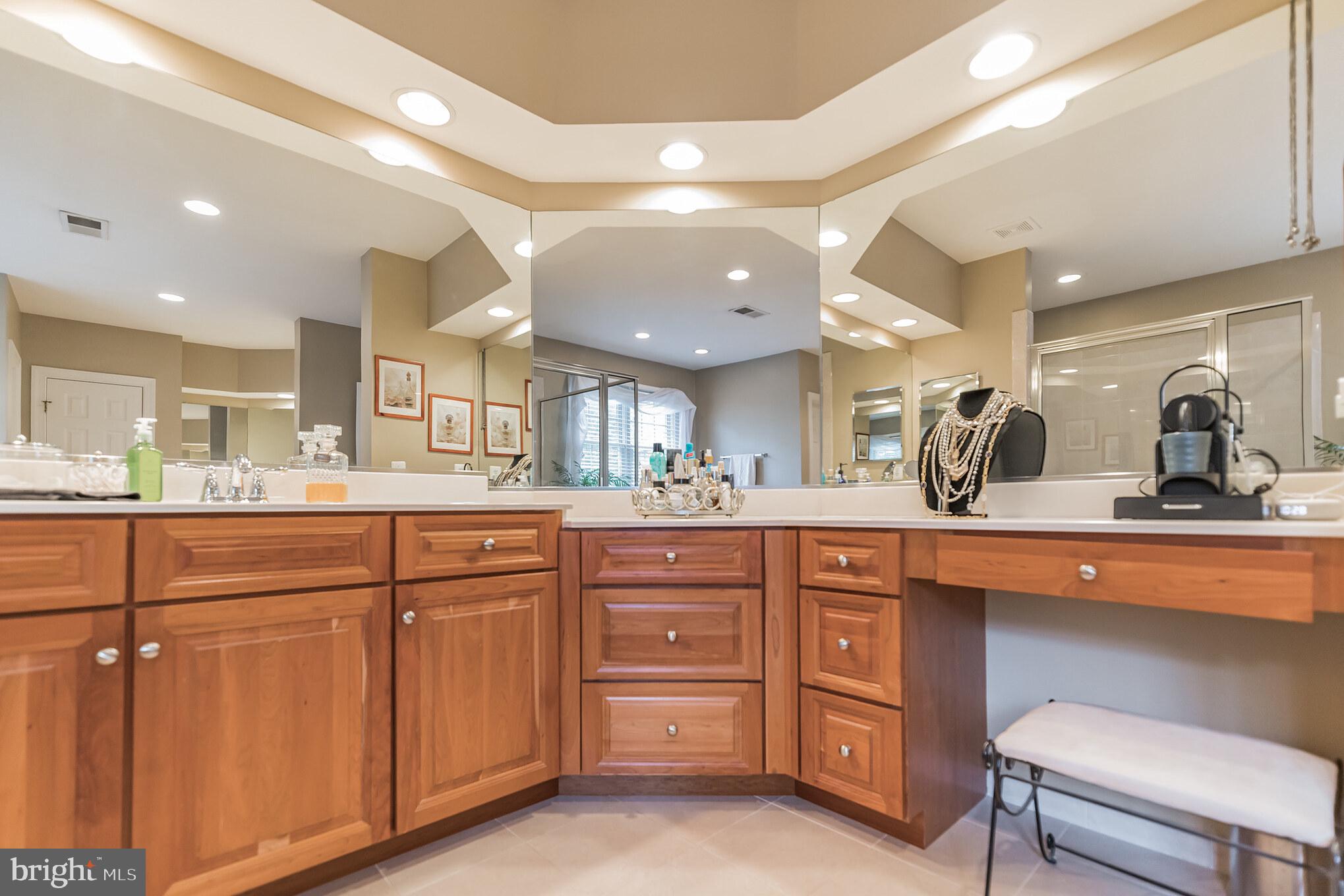 8347 Roxborough Loop Gainesville, VA 20155 - Photo 25 of 52 Separate vanities with Cherry cabinets