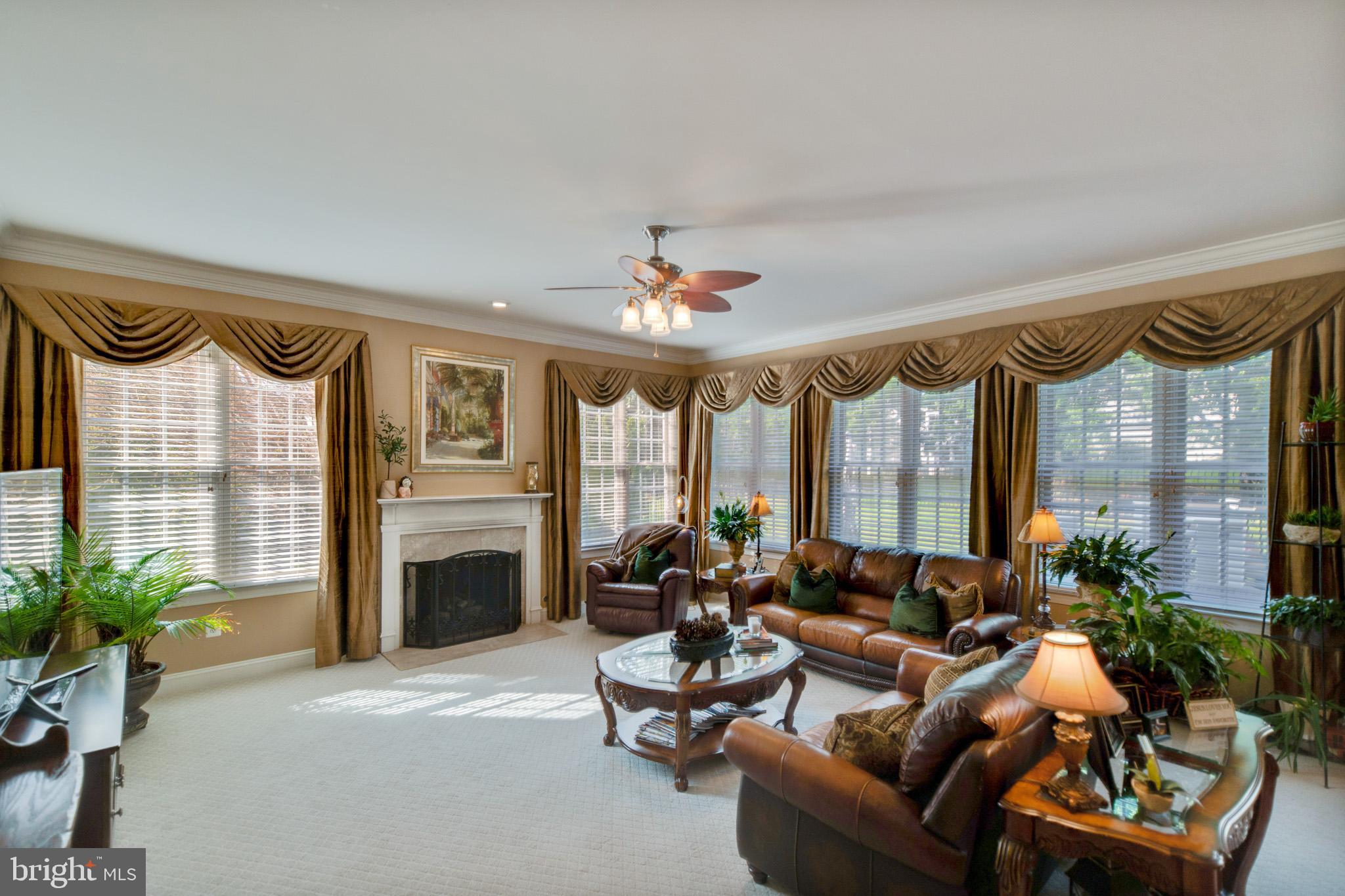 8347 Roxborough Loop Gainesville, VA 20155 - Photo 8 of 52 Sunken Family room with new lush carpet