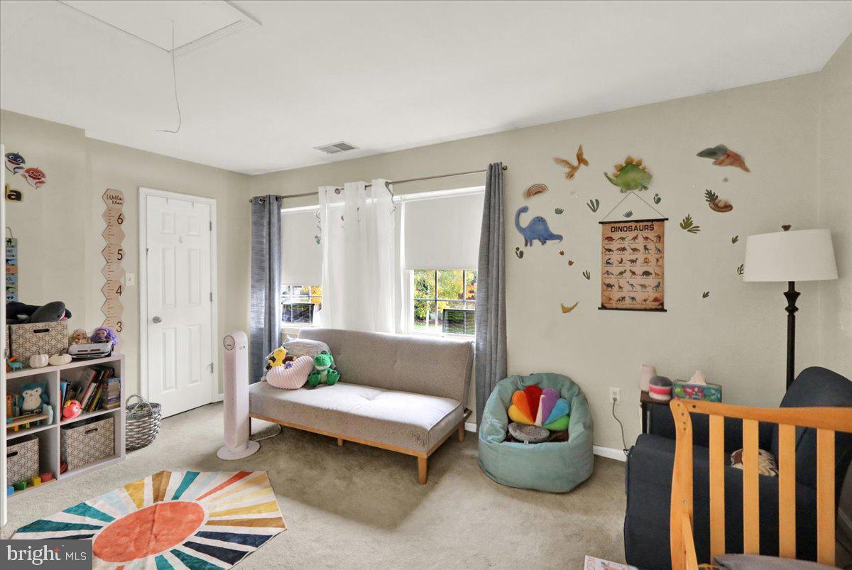 120 Laurel Court Reading, PA 19610 - Photo 16 of 21 a living room with furniture and book shelf