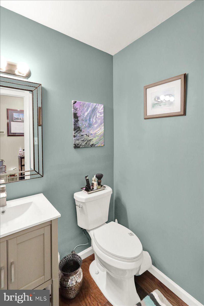 120 Laurel Court Reading, PA 19610 - Photo 4 of 21 a bathroom with a toilet a sink and mirror