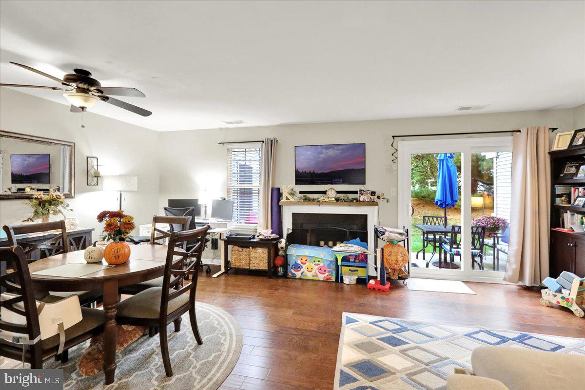 120 Laurel Court Reading, PA 19610 - Photo 5 of 21 a living room with furniture a fireplace and a flat screen tv