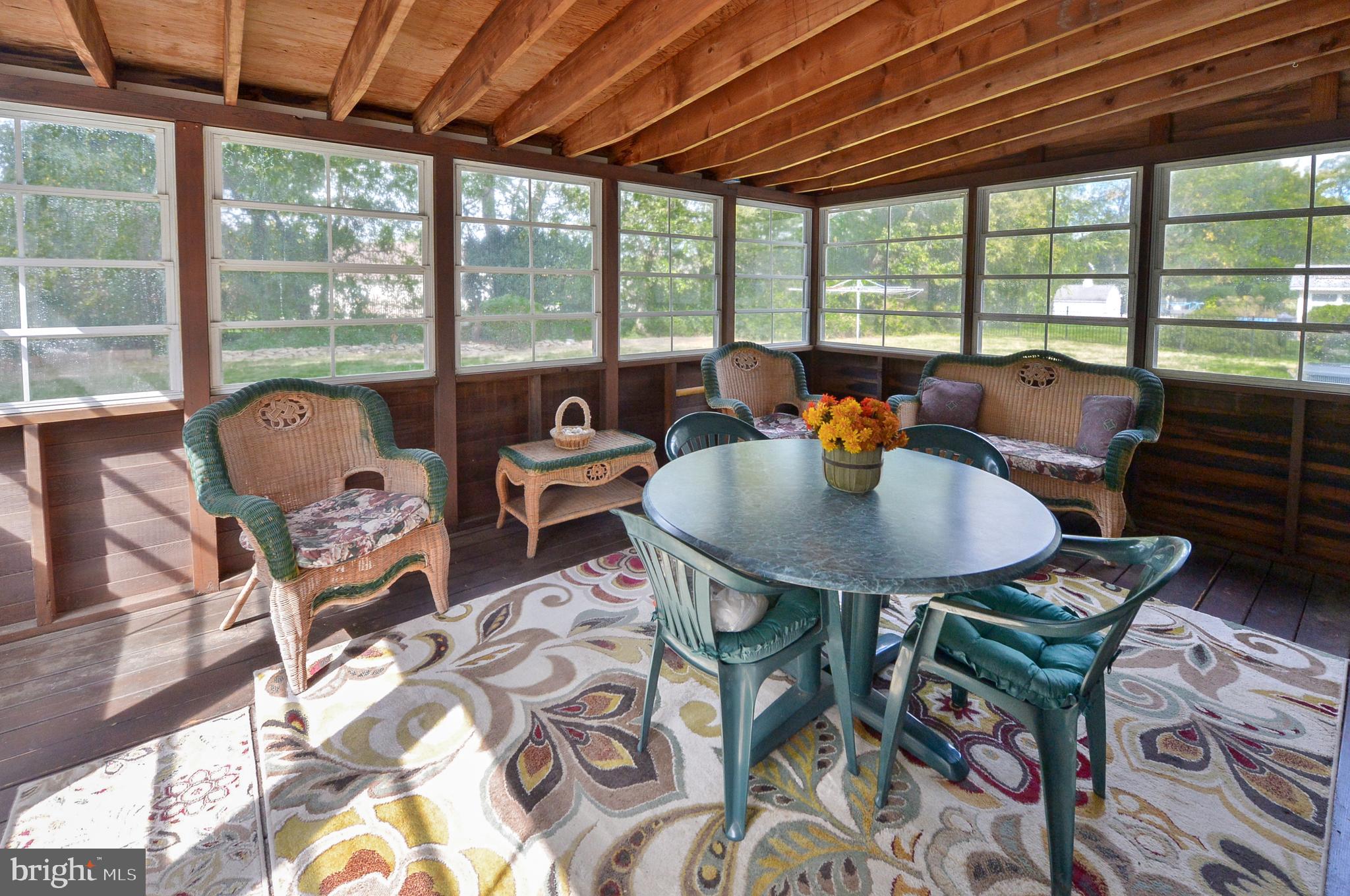 437 Cedar Lane Mickleton, NJ 08056 - Photo 11 of 29 a outdoor dining space with furniture and outdoor view