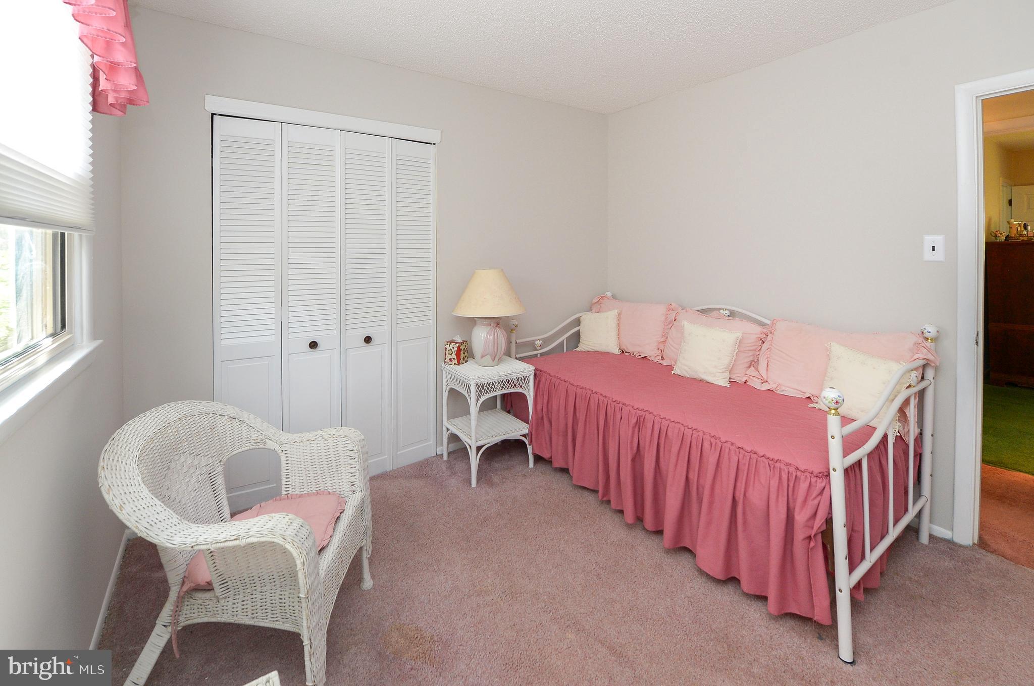 437 Cedar Lane Mickleton, NJ 08056 - Photo 13 of 29 a bedroom with a bed and a chandelier