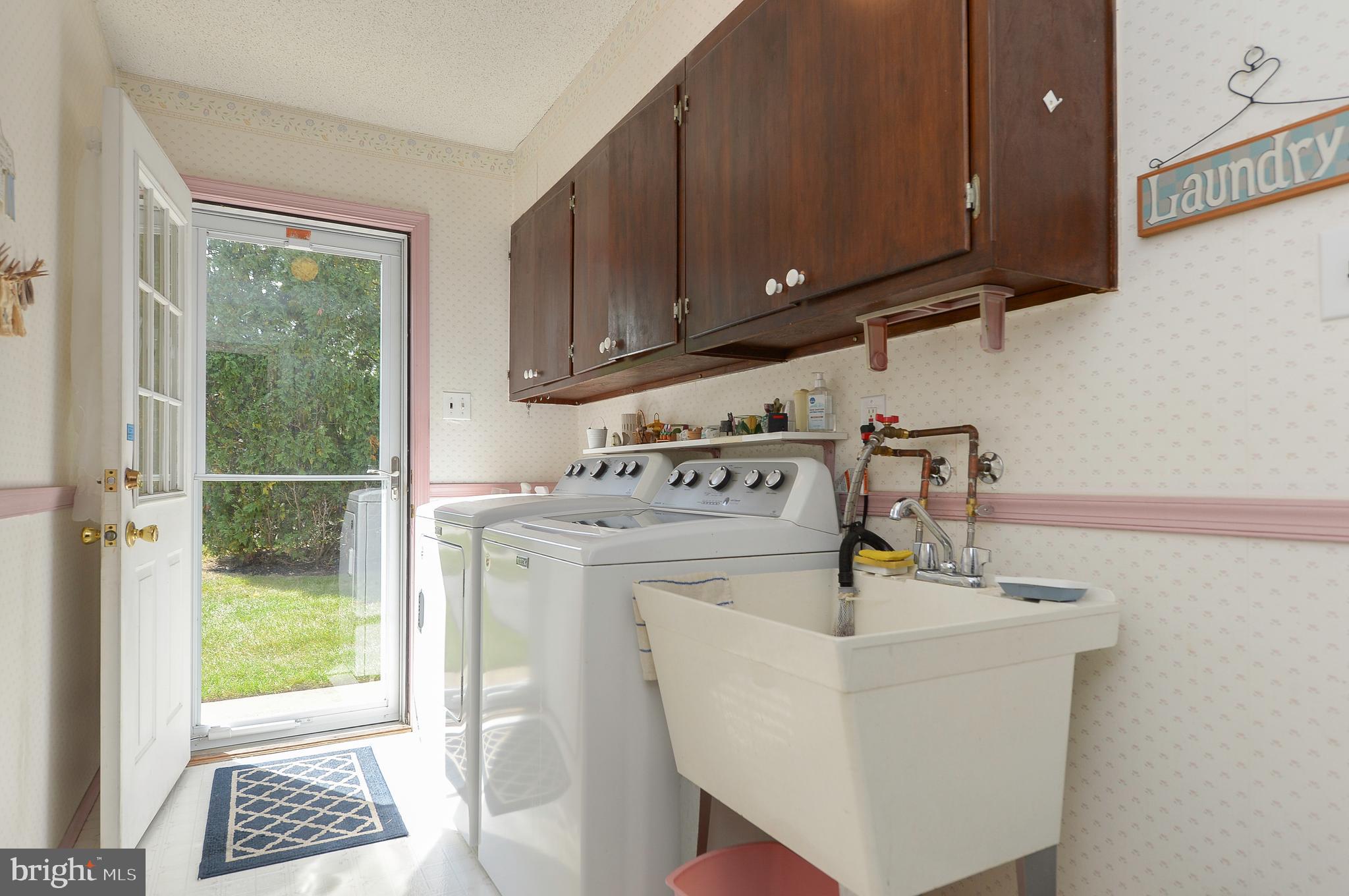 437 Cedar Lane Mickleton, NJ 08056 - Photo 14 of 29 a utility room with sink dryer and washer