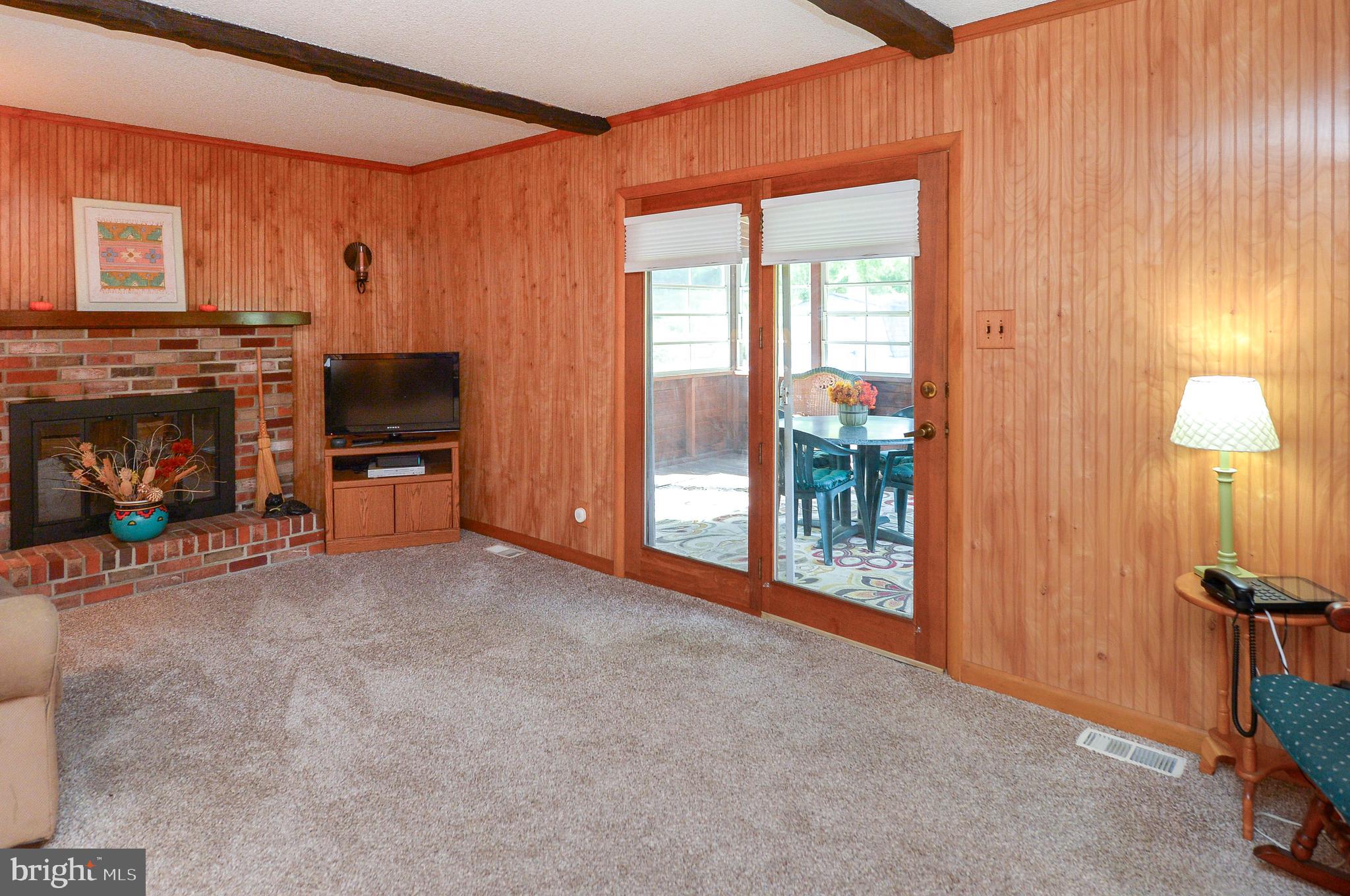 437 Cedar Lane Mickleton, NJ 08056 - Photo 15 of 29 a view of a livingroom with furniture and a fireplace