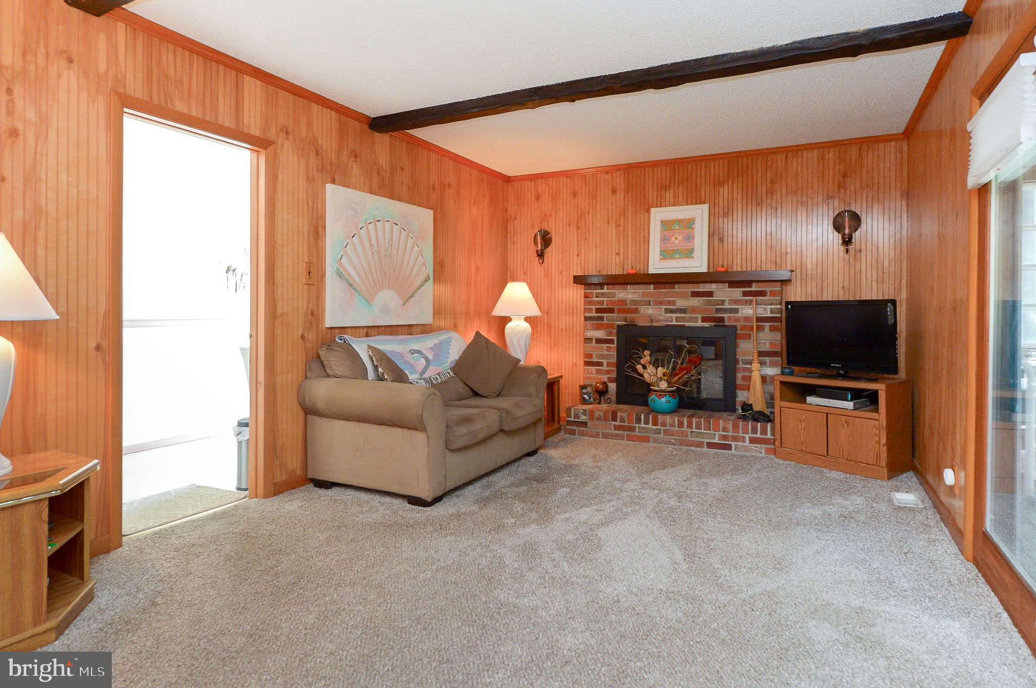 437 Cedar Lane Mickleton, NJ 08056 - Photo 16 of 29 a living room with furniture and a flat screen tv