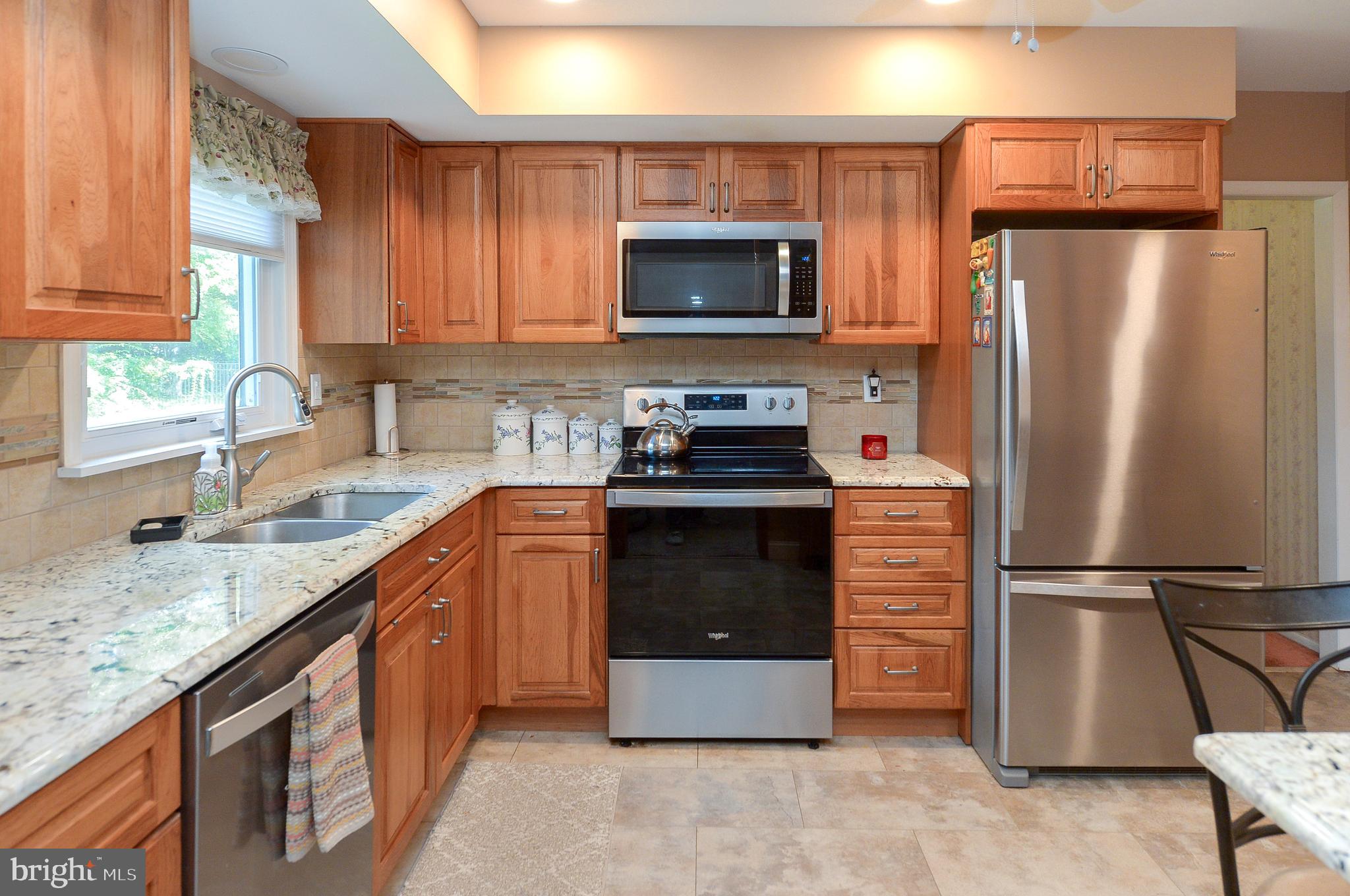 437 Cedar Lane Mickleton, NJ 08056 - Photo 18 of 29 a kitchen with a refrigerator sink and microwave