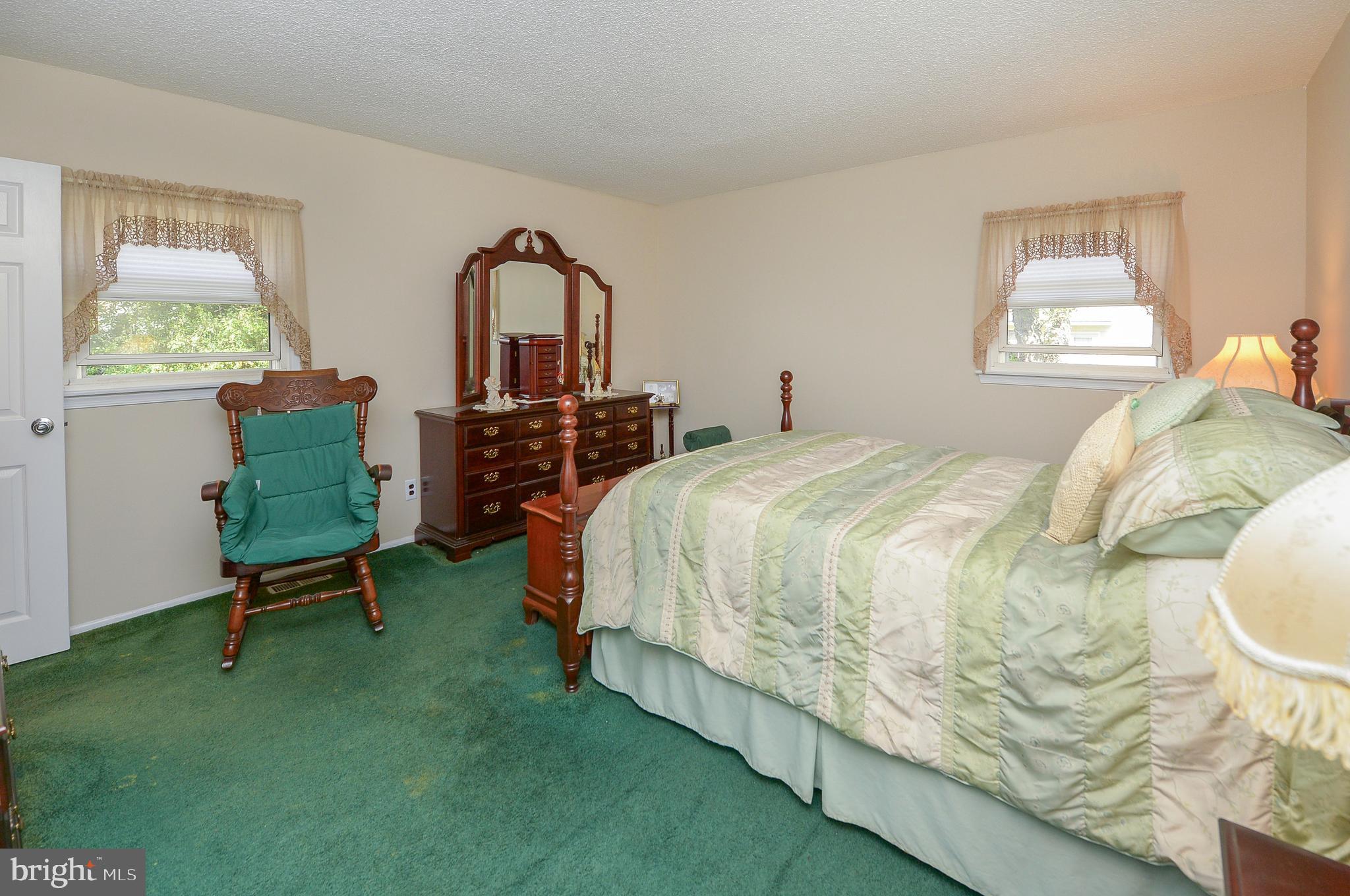 437 Cedar Lane Mickleton, NJ 08056 - Photo 26 of 29 a bedroom with a bed and a window