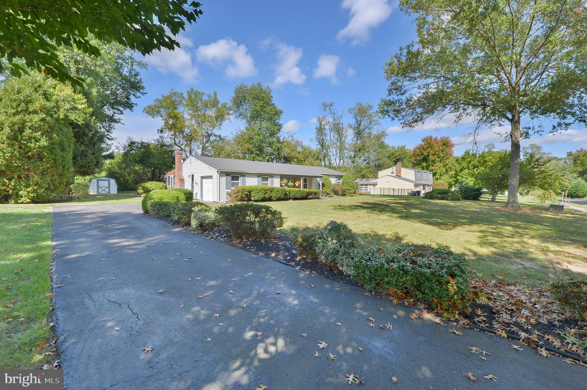437 Cedar Lane Mickleton, NJ 08056 - Photo 4 of 29 a view of a house with a yard and sitting area