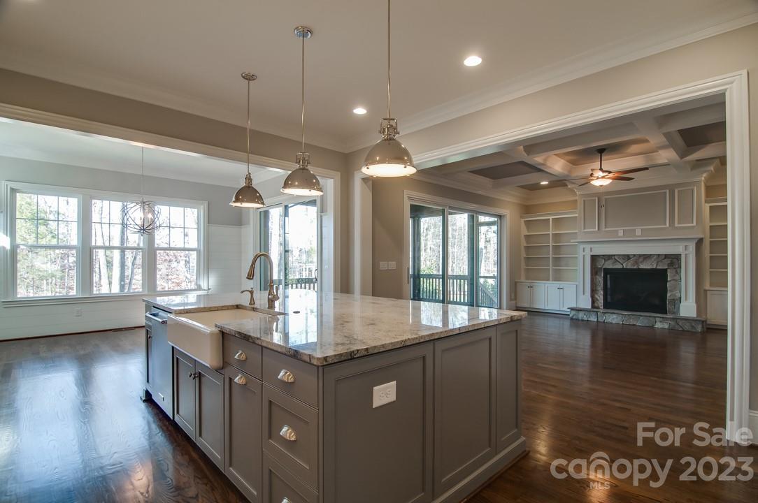 2837 Holbrook Road, Unit 26 Fort Mill, SC 29715 - Photo 7 of 14 a kitchen with counter top space and wooden floor