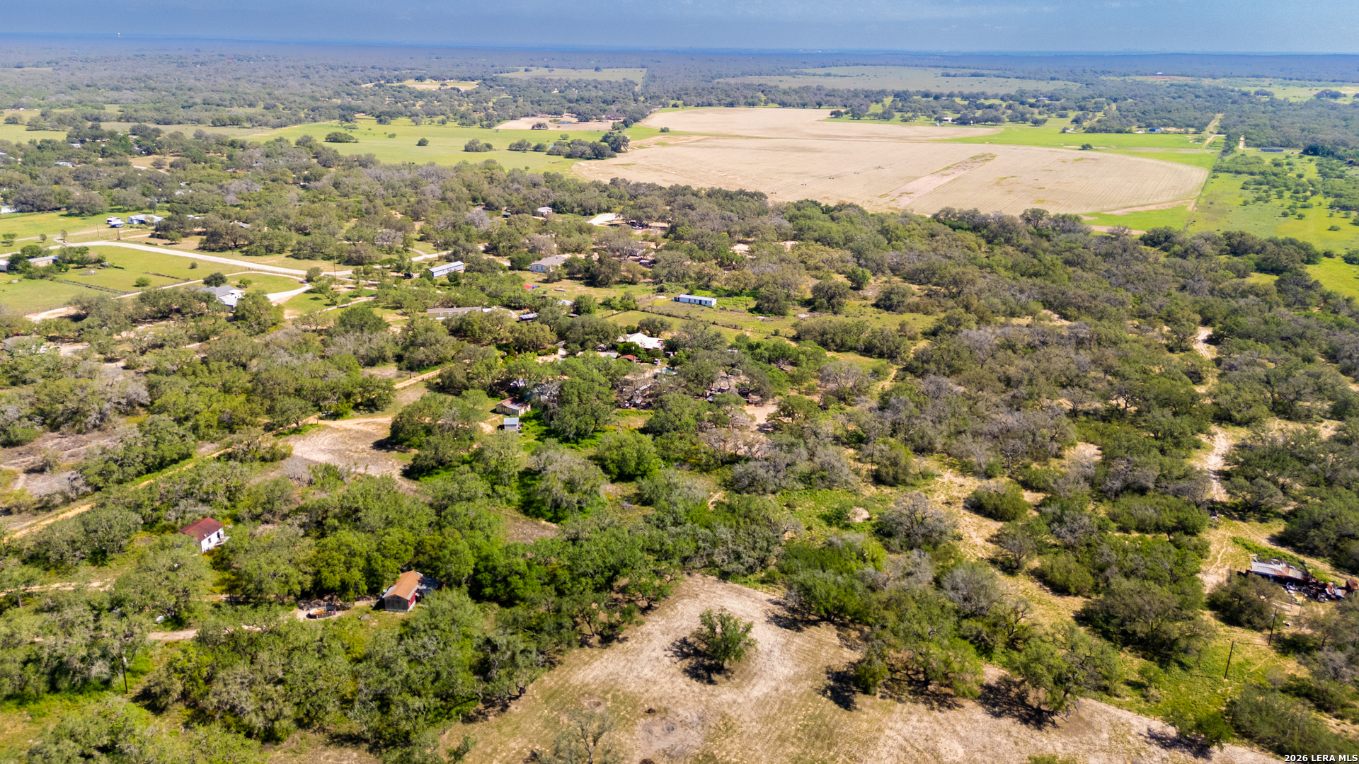 230 P R D65 Poteet, TX 78065 - Photo 17 of 29 a view of a field with an ocean