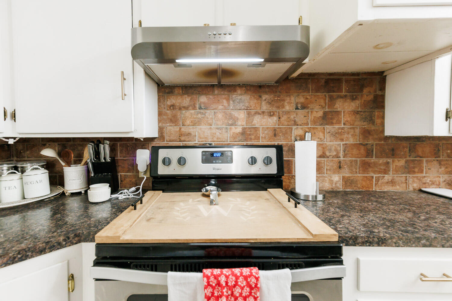 2718 55th Street Lubbock, TX 79413 - Photo 21 of 58 a stove top oven sitting inside of a kitchen