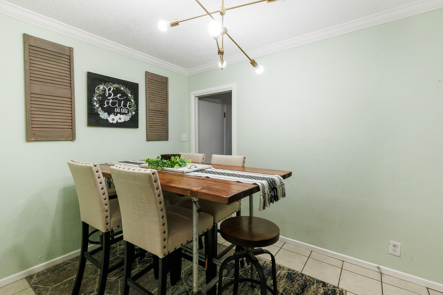 2718 55th Street Lubbock, TX 79413 - Photo 24 of 58 a dining room with a table and chairs