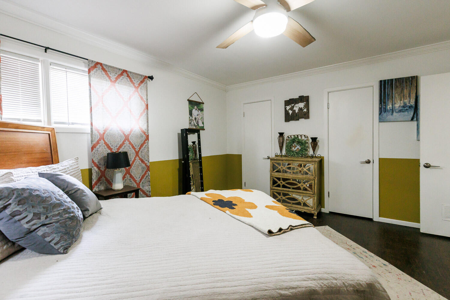2718 55th Street Lubbock, TX 79413 - Photo 33 of 58 a bedroom with a bed and wooden floor