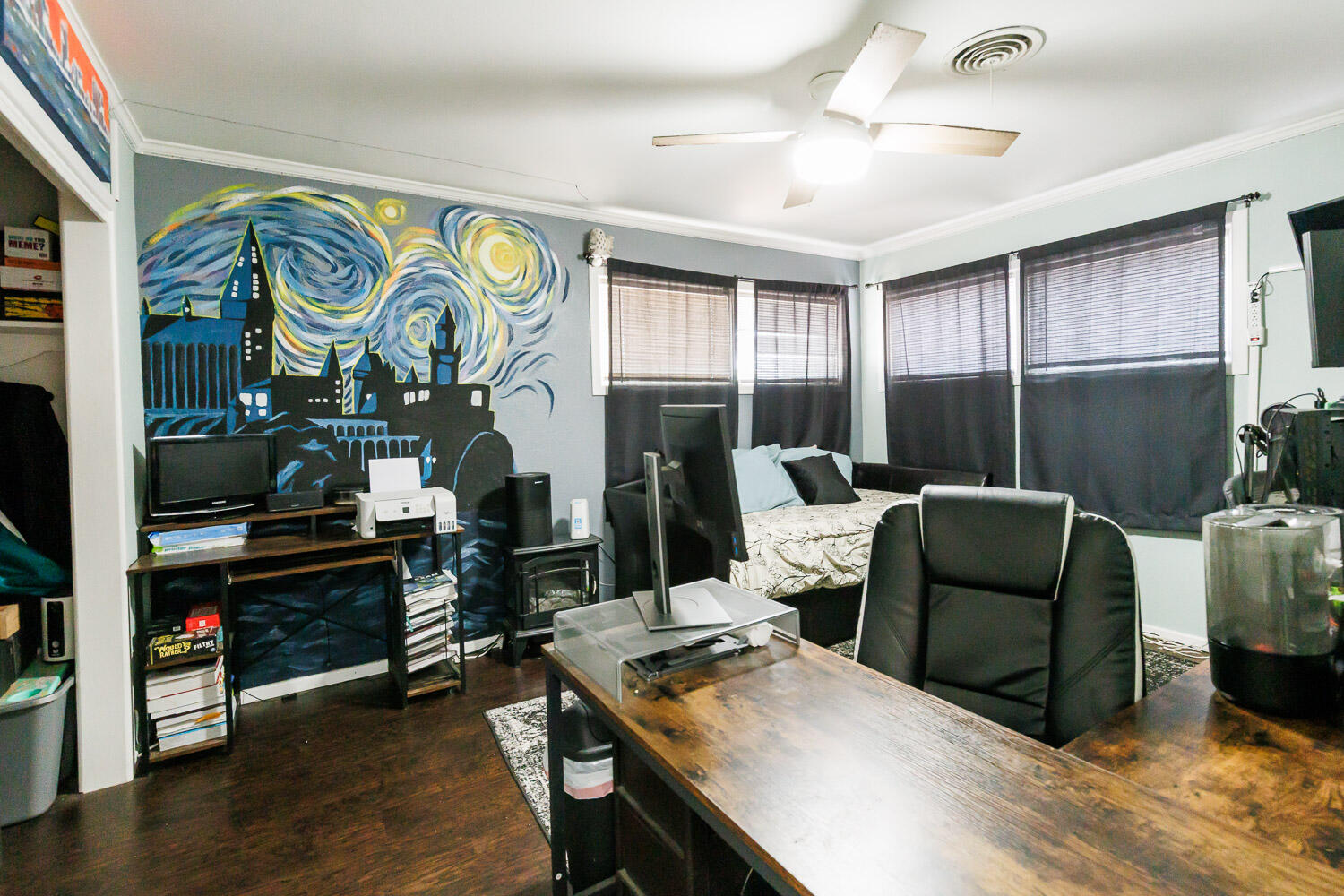2718 55th Street Lubbock, TX 79413 - Photo 39 of 58 a living room with furniture and wooden floor