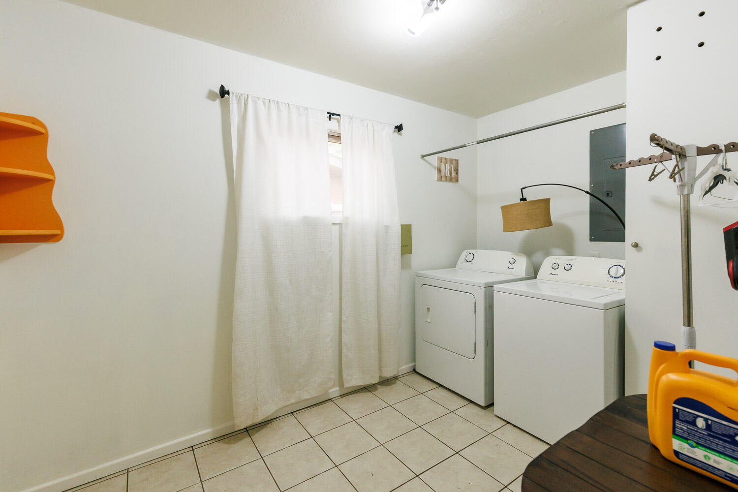 2718 55th Street Lubbock, TX 79413 - Photo 43 of 58 a utility room with dryer and washer