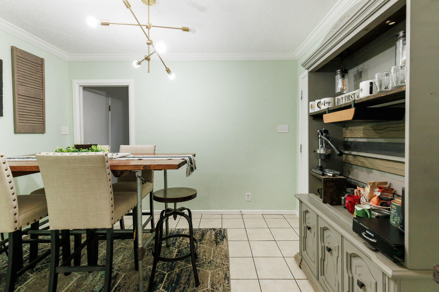 2718 55th Street Lubbock, TX 79413 - Photo 47 of 58 a kitchen with a table and chairs in it