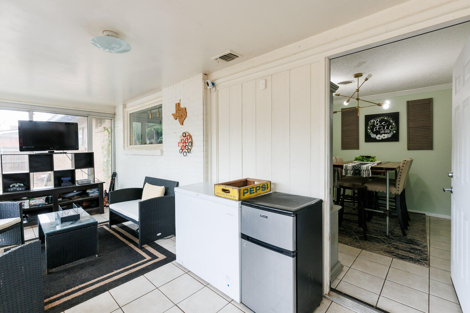 2718 55th Street Lubbock, TX 79413 - Photo 49 of 58 a view of kitchen with cabinets and outdoor space