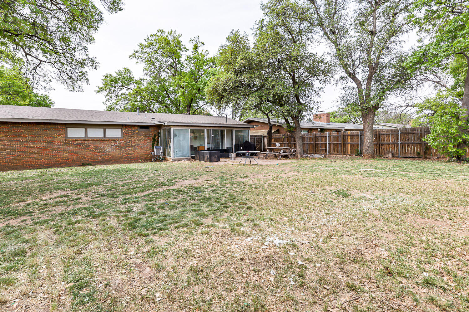 2718 55th Street Lubbock, TX 79413 - Photo 50 of 58 front view of a house with a yard